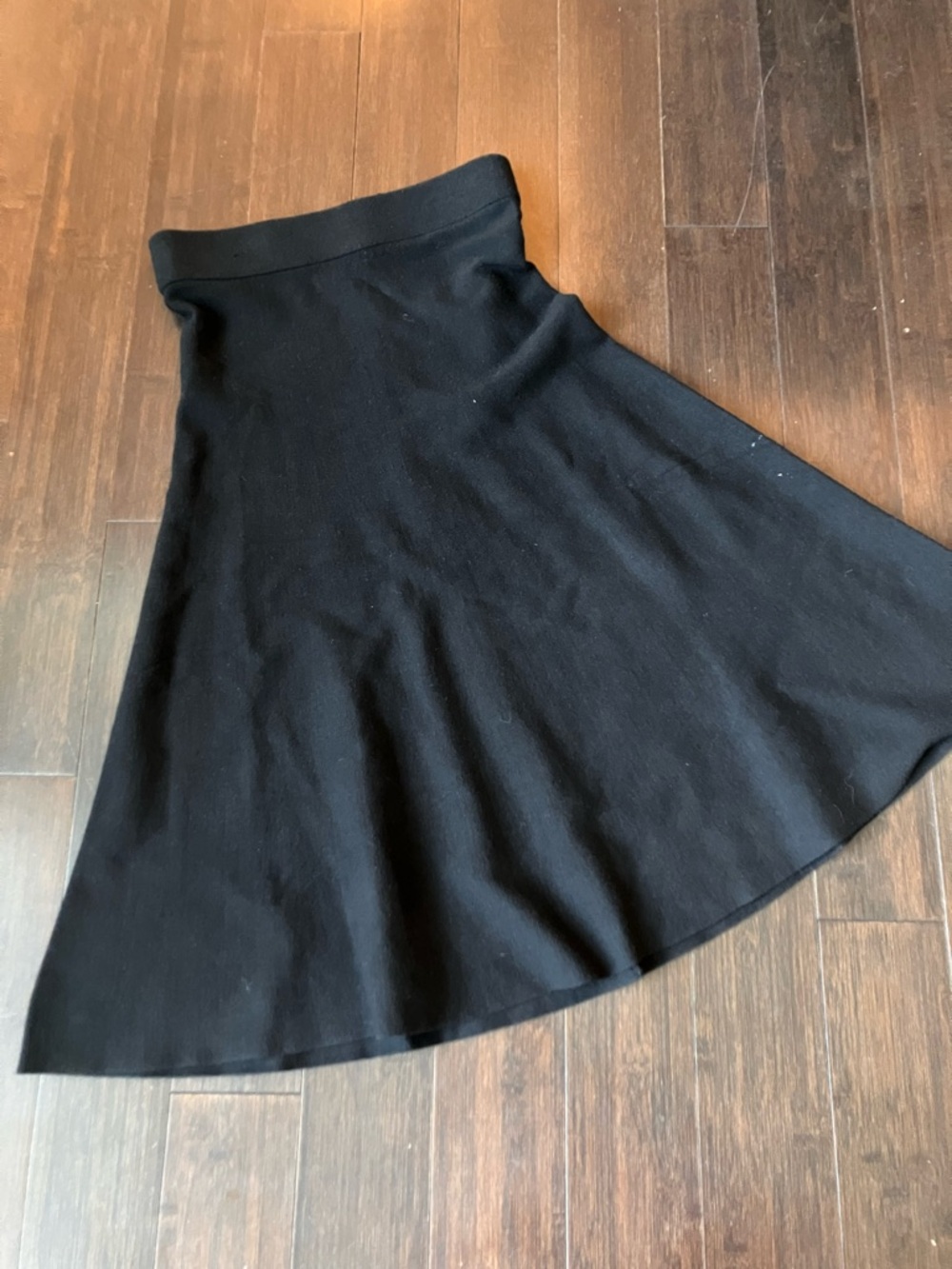 H by Halston Black Circle Skirt. Tight knit. Hangs very nicely.